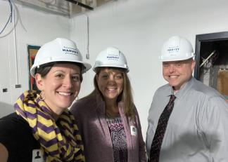 From left, Chrissy Vander Hook and Diane Lewis of the New Hampshire Department of Education join Eric Perry, director and principal at Sugar River Valley Regional Technical Center in Newport, for a tour of the school’s ongoing renovation project. 